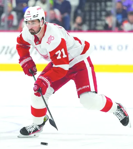 Still with Red Wings, Larkin stripped of captaincy
